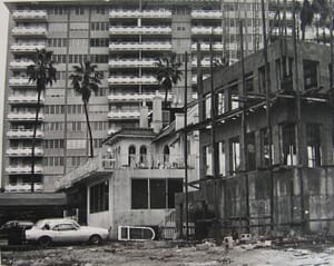 Vacant Commodore Club in 1981. Babylon Apartments being built in foreground.
