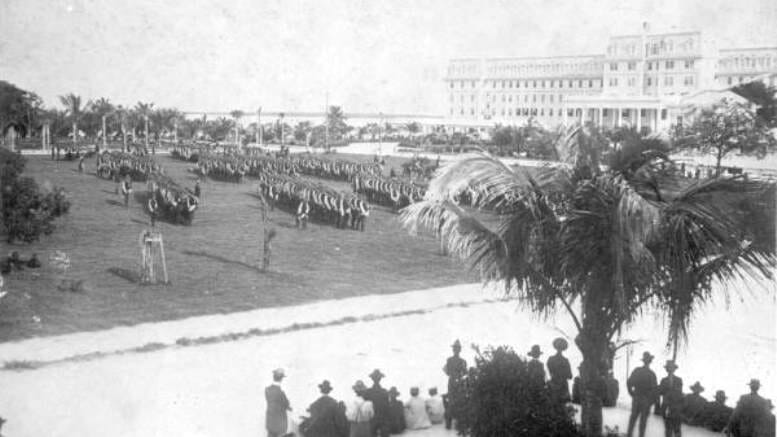 Soldiers marching on Royal Palm Park in 1898.