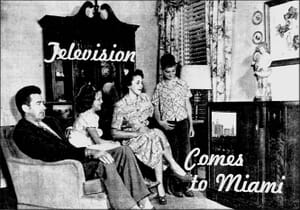Family around TV set in 1949