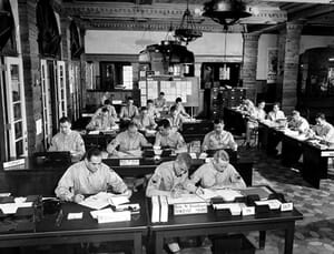 Army Personnel Working in Lobby of Hotel Evans in 1942