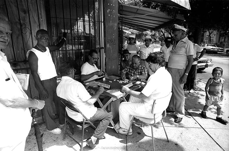Puerto Rican men playing dominoes along NW Second Avenue in Wynwood